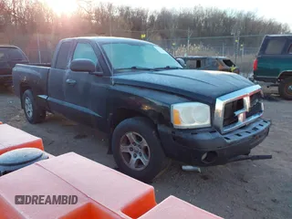 2005 Dodge Dakota SLT with VIN 1D7HW42N95S315558, listed as a IAAI auction lot 41210145 with 207,115 mi miles and . Bid and sale history available at DreamBid. Image 1.