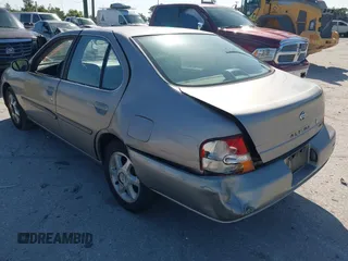 1999 Nissan Altima XE with VIN 1N4DL01D1XC255927, listed as a IAAI auction lot 42003101 with 154,000 mi miles. Bid and sale history available at carsss.com. Image 6.