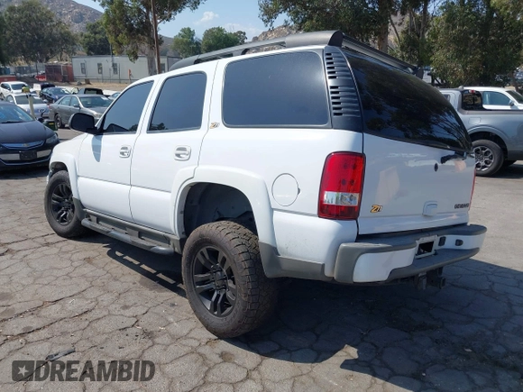 2004 Chevrolet Tahoe Z71 z VIN 1GNEK13Z04R258348, wystawiony jako IAAI lot #42371719 z przebiegiem 125 457 mil mil oraz . Historia ofert i sprzedaży dostępna na DreamBid. Obrazek 3.