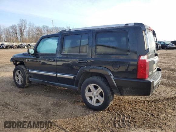 2010 Jeep Commander Limited with VIN 1J4RG5GT6AC113462, listed as a Copart auction lot 82400044 with 189,168 mi miles and Salvage title. Bid and sale history available at DreamBid. Image 2.