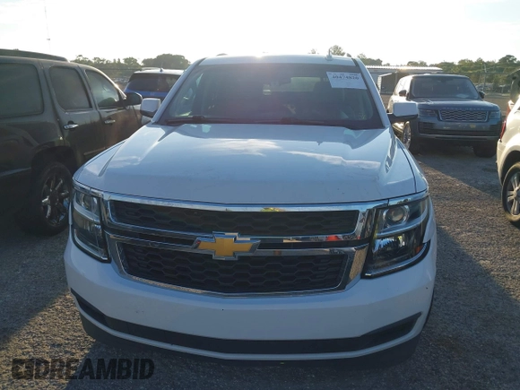 2018 Chevrolet Suburban LT with VIN 1GNSCHKC8JR358781, listed as a IAAI auction lot 40474820 with Not Provided miles and . Bid and sale history available at DreamBid. Image 12.