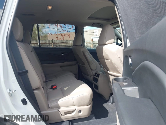 2021 Honda Pilot EX-L with VIN 5FNYF6H57MB054147, listed as a IAAI auction lot 42158910 with 37,811 mi miles and . Bid and sale history available at DreamBid. Image 8.