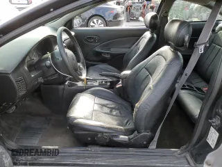 2001 Saturn SC z VIN 1G8ZY14701Z255767, wystawiony jako Copart lot #53727985 z przebiegiem 137 776 mil mil oraz Szkody całkowita. Historia ofert i sprzedaży dostępna na DreamBid. Obrazek 7.