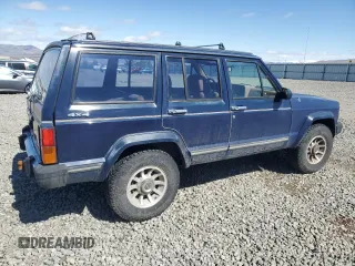 1987 Jeep Cherokee with VIN 1JCMT7842HT114597, listed as a Copart auction lot 49319945 with 230,675 mi miles and Clean title. Bid and sale history available at DreamBid. Image 3.