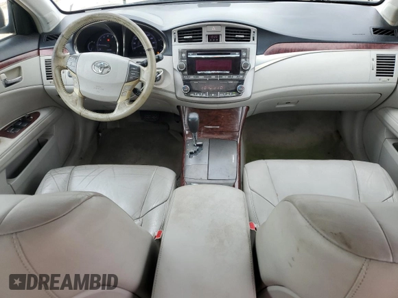 2012 Toyota Avalon z VIN 4T1BK3DBXCU454457, wystawiony jako Copart lot #57153835 z przebiegiem 128 064 mil mil oraz Szkoda całkowita • Salvage title. Historia ofert i sprzedaży dostępna na DreamBid. Obrazek 8.