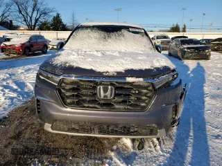 2025 Honda Pilot EX-L with VIN 5FNYG1H43SB026690, listed as a Copart auction lot 89387255 with 6,028 mi miles and Salvage Title. Bid and sale history available at carsss.com. Image 5.