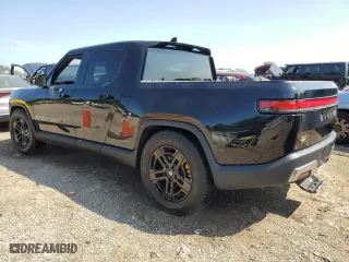 2024 Rivian R1T Adventure Package with VIN 7FCTGAAA3RN033543, listed as a Copart auction lot 65133364 with 0 mi miles and Salvage Title. Bid and sale history available at carsss.com. Image 2.