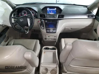 2014 Honda Odyssey Touring with VIN 5FNRL5H93EB079817, listed as a Copart auction lot 56231645 with 65,521 mi miles and Salvage title. Bid and sale history available at DreamBid. Image 8.