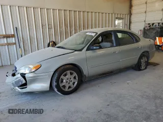 2007 Ford Taurus SE z VIN 1FAFP53U47A211360, wystawiony jako Copart lot #73974624 z przebiegiem Nie podano mil oraz Szkoda całkowita • Salvage title. Historia ofert i sprzedaży dostępna na DreamBid. Obrazek 1.
