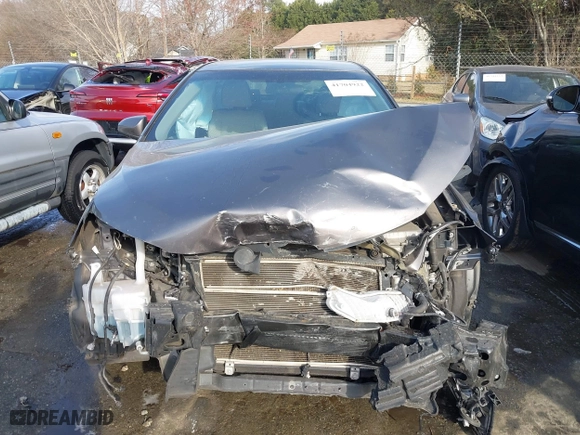 2015 Toyota Camry Hybrid LE with VIN 4T1BD1FK5FU164384, listed as a IAAI auction lot 41704922 with 122,132 mi miles. Bid and sale history available at carsss.com. Image 12.