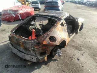 2013 Nissan 370Z Touring z VIN JN1AZ4EH6DM382892, wystawiony jako IAAI lot #41255359 z przebiegiem Nie podano mil oraz . Historia ofert i sprzedaży dostępna na DreamBid. Obrazek 5.