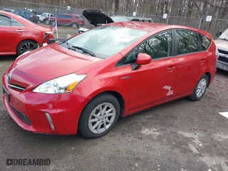 2014 Toyota Prius v Two with VIN JTDZN3EU8EJ003297, listed as a IAAI auction lot 41677576 with 117,180 mi miles. Bid and sale history available at carsss.com. Image 23.