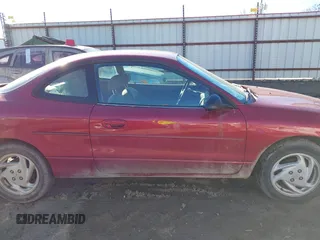 2002 Ford Escort ZX2 Standard z VIN 3FAFP11382R198680, wystawiony jako IAAI lot #41420862 z przebiegiem 184 102 mil mil oraz . Historia ofert i sprzedaży dostępna na DreamBid. Obrazek 13.