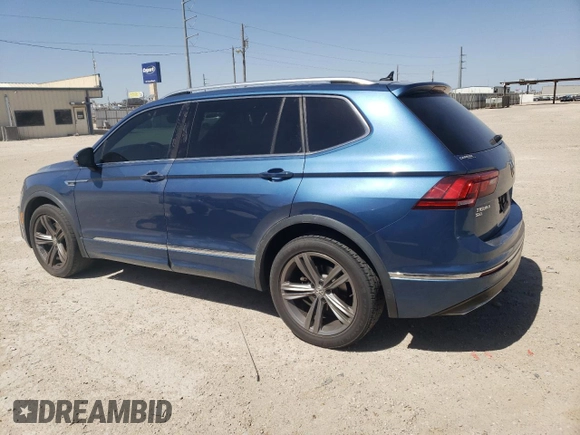 2019 Volkswagen Tiguan SE with VIN 3VV3B7AX4KM061848, listed as a Copart auction lot 49978745 with 100,295 mi miles and Salvage Title. Bid and sale history available at DreamBid. Image 2.