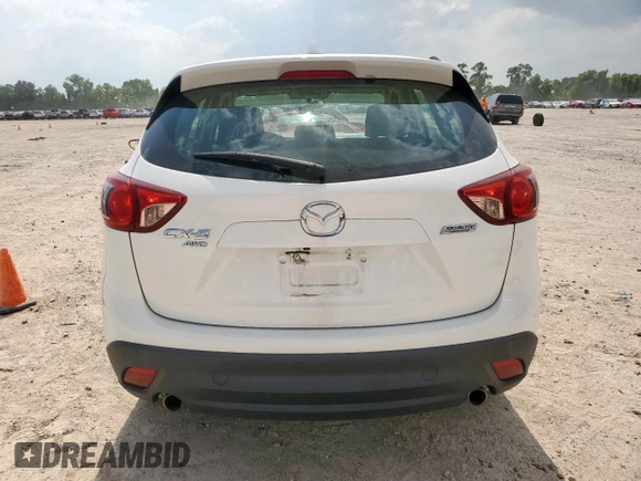 2016 Mazda CX-5 Sport with VIN JM3KE4BY0G0742436, listed as a Copart auction lot 59693945 with 74,314 mi miles and Salvage title. Bid and sale history available at DreamBid. Image 6.