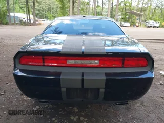 2013 Dodge Challenger SXT z VIN 2C3CDYAG2DH632743, wystawiony jako IAAI lot #42201981 z przebiegiem 154 018 mil mil oraz . Historia ofert i sprzedaży dostępna na DreamBid. Obrazek 17.