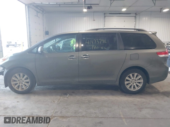 2011 Toyota Sienna XLE with VIN 5TDDK3DC6BS025101, listed as a IAAI auction lot 41473796 with 211,467 mi miles. Bid and sale history available at carsss.com. Image 15.
