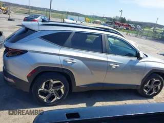 2022 Hyundai Tucson SEL with VIN 5NMJCCAE4NH078991, listed as a IAAI auction lot 41990599 with 37,384 mi miles and . Bid and sale history available at DreamBid. Image 14.