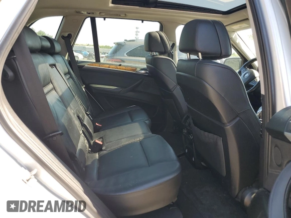 2012 BMW X5 35i with VIN 5UXZV4C5XCL749204, listed as a Copart auction lot 62012985 with 94,636 mi miles and Clean title. Bid and sale history available at DreamBid. Image 11.