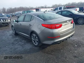 2014 Kia Optima SX Turbo with VIN 5XXGR4A64EG286133, listed as a IAAI auction lot 41489575 with 68,573 mi miles and . Bid and sale history available at DreamBid. Image 3.