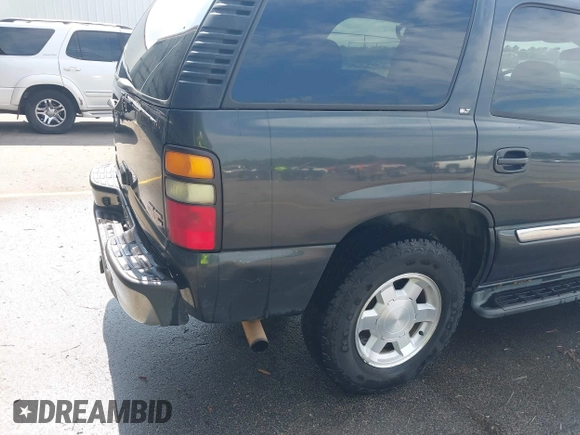 2005 GMC Yukon SLT z VIN 1GKEK13T75J214291, wystawiony jako IAAI lot #42308154 z przebiegiem 286 500 mil mil oraz . Historia ofert i sprzedaży dostępna na DreamBid. Obrazek 6.
