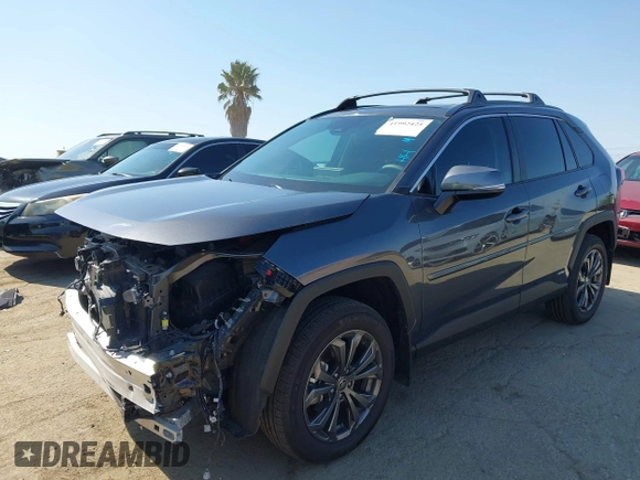 2024 Toyota RAV4 Hybrid XLE Premium with VIN 2T3B6RFV5RW058841, listed as a IAAI auction lot 41992425 with 22,073 mi miles and . Bid and sale history available at DreamBid. Image 2.