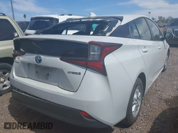 2022 Toyota Prius L Eco with VIN JTDKAMFUXN3181752, listed as a IAAI auction lot 42015717 with 129,637 mi miles and . Bid and sale history available at DreamBid. Image 4.