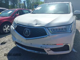 2020 Acura MDX w/Technology Pkg with VIN 5J8YD3H56LL013803, listed as a IAAI auction lot 41983696 with 58,346 mi miles. Bid and sale history available at carsss.com. Image 6.