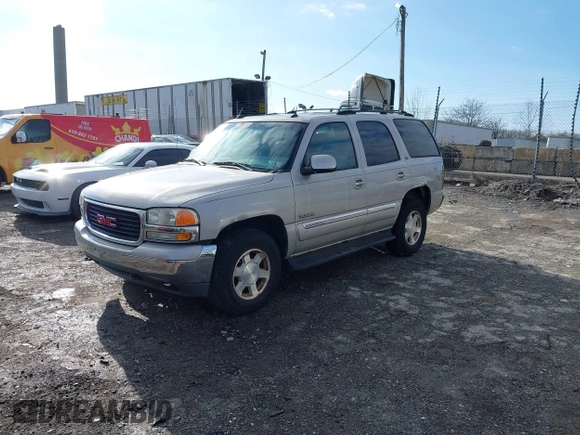 2004 GMC Yukon SLT with VIN 1GKEK13Z64J254137, listed as a IAAI auction lot 41499284 with 147,310 mi miles. Bid and sale history available at carsss.com. Image 2.