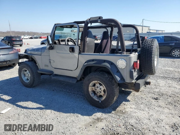 2001 Jeep Wrangler SE with VIN 1J4FA29P21P329675, listed as a Copart auction lot 45634015 with 191,625 mi miles and Salvage Title. Bid and sale history available at carsss.com. Image 2.