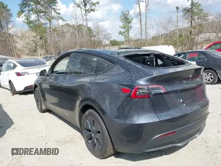 2025 Tesla Model Y Long Range with VIN 7SAYGDED3SA352138, listed as a IAAI auction lot 41760798 with 1,209 mi miles and . Bid and sale history available at DreamBid. Image 13.