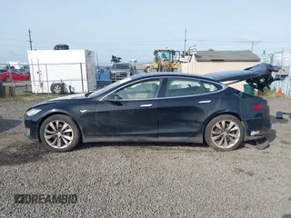 2014 Tesla Model S 60 with VIN 5YJSA1H12EFP53787, listed as a IAAI auction lot 42279493 with 168,859 mi miles and . Bid and sale history available at DreamBid. Image 14.