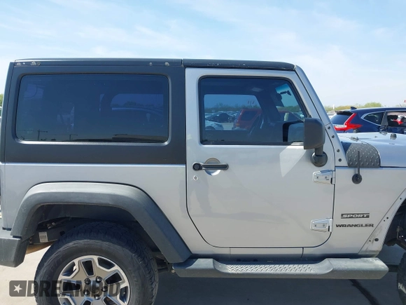 2014 Jeep Wrangler Sport with VIN 1C4AJWAG9EL155409, listed as a IAAI auction lot 41869906 with 102,400 mi miles and . Bid and sale history available at carsss.com. Image 14.