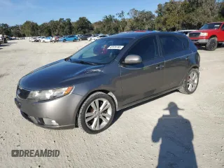 2012 Kia Forte SX с VIN KNAFW5A3XC5518104, выставлен на аукционе Copart как лот 42579785 с пробегом 130 111 миль миль и Списание • Salvage title. История ставок и продаж доступна на DreamBid. Изображение 1.