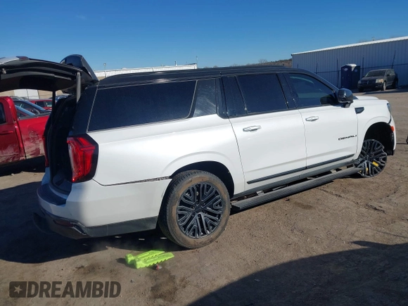 2021 GMC Yukon XL Denali with VIN 1GKS2JKT1MR401207, listed as a IAAI auction lot 41242619 with 87,902 mi miles and . Bid and sale history available at carsss.com. Image 4.