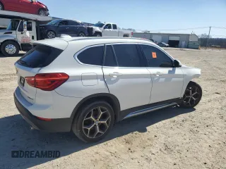 2018 BMW X1 xDrive28i with VIN WBXHT3C38J3H32142, listed as a Copart auction lot 48677365 with 0 mi miles and Clean Title. Bid and sale history available at carsss.com. Image 3.