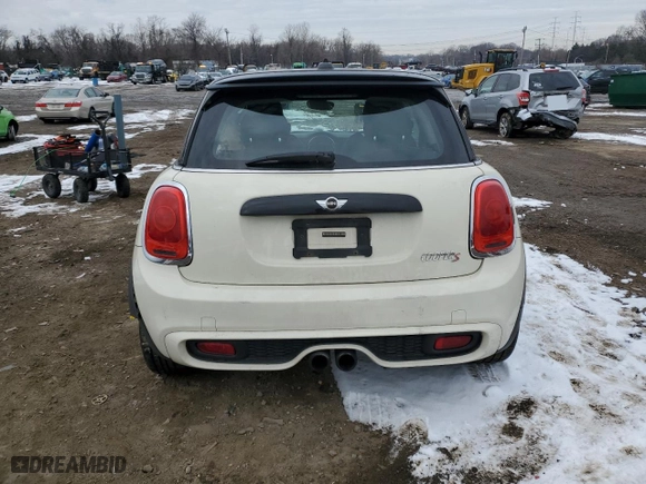 2014 MINI Cooper Hardtop S with VIN WMWXM7C51ET987715, listed as a Copart auction lot 87689985 with NaN miles and Salvage Title. Bid and sale history available at carsss.com. Image 6.