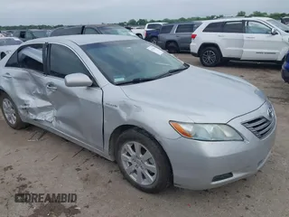 2007 Toyota Camry z VIN 4T1BB46K77U016682, wystawiony jako IAAI lot #42119657 z przebiegiem 97 524 mil mil oraz . Historia ofert i sprzedaży dostępna na DreamBid. Obrazek 1.