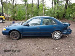 2000 Chevrolet Prizm LSi z VIN 1Y1SK5289YZ401584, wystawiony jako IAAI lot #42263210 z przebiegiem 151 567 mil mil oraz . Historia ofert i sprzedaży dostępna na DreamBid. Obrazek 14.