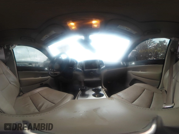 2014 Jeep Grand Cherokee Limited with VIN 1C4RJFBT1EC200888, listed as a IAAI auction lot 42435488 with 117,691 mi miles and . Bid and sale history available at DreamBid. Image 19.