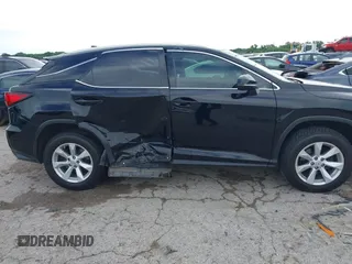 2016 Lexus RX 350 z VIN 2T2BZMCA4GC017342, wystawiony jako IAAI lot #42357093 z przebiegiem 142 515 mil mil oraz . Historia ofert i sprzedaży dostępna na DreamBid. Obrazek 13.