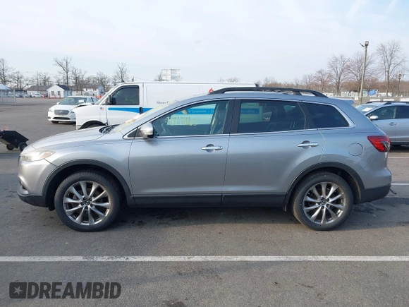 2015 Mazda CX-9 Grand Touring with VIN JM3TB3DA6F0447184, listed as a IAAI auction lot 41771865 with 137,814 mi miles. Bid and sale history available at carsss.com. Image 14.