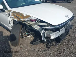 2024 Hyundai Sonata SEL z VIN KMHL64JA4RA395863, wystawiony jako IAAI lot #41801732 z przebiegiem 3 034 mil mil oraz . Historia ofert i sprzedaży dostępna na DreamBid. Obrazek 6.