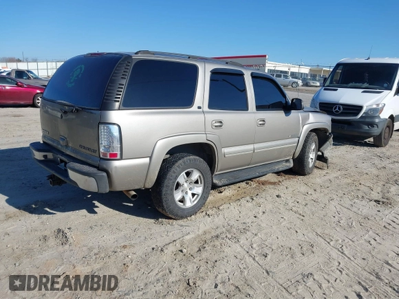 2003 Chevrolet Tahoe LS with VIN 1GNEK13Z03J294201, listed as a IAAI auction lot 41656836 with 302,922 mi miles. Bid and sale history available at carsss.com. Image 4.