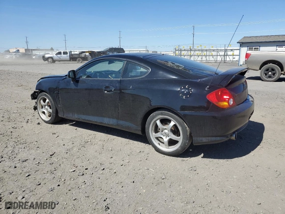 2004 Hyundai Tiburon GT with VIN KMHHN65F94U113699, listed as a Copart auction lot 53858355 with 221,999 mi miles and Salvage Title. Bid and sale history available at carsss.com. Image 2.