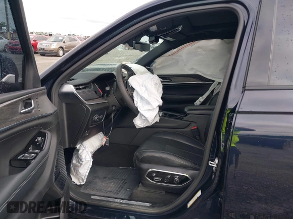 2023 Jeep Grand Cherokee Overland with VIN 1C4RJHDG8P8822650, listed as a IAAI auction lot 42145252 with 63,100 mi miles and . Bid and sale history available at DreamBid. Image 5.