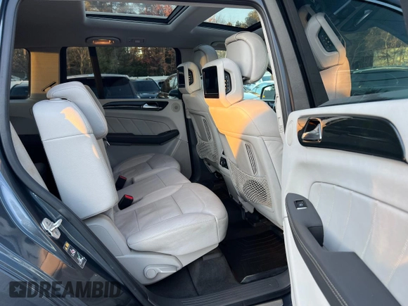 2016 Mercedes-Benz GL with VIN 4JGDF2EEXGA682823, listed as a Copart auction lot 82710124 with 216,598 mi miles and Clean Title. Bid and sale history available at carsss.com. Image 6.