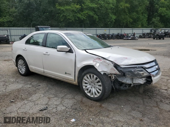 2012 Ford Fusion Hybrid с VIN 3FADP0L35CR184476, выставлен на аукционе Copart как лот 63907885 с пробегом 230 589 миль миль и Списание • Salvage title. История ставок и продаж доступна на DreamBid. Изображение 4.