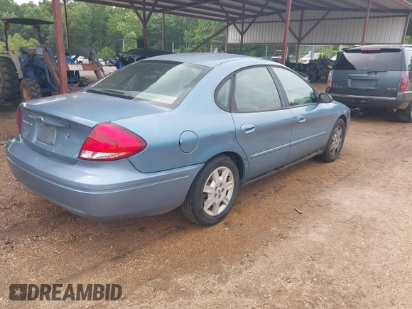 2006 Ford Taurus SE with VIN 1FAHP53226A245951, listed as a IAAI auction lot 42389703 with Not provided miles and . Bid and sale history available at DreamBid. Image 4.