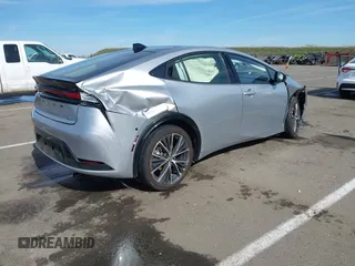 2023 Toyota Prius LE with VIN JTDACAAU4P3014110, listed as a IAAI auction lot 41546457 with 23,175 mi miles. Bid and sale history available at carsss.com. Image 4.